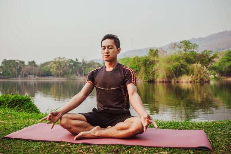young-man-sitting-meditating