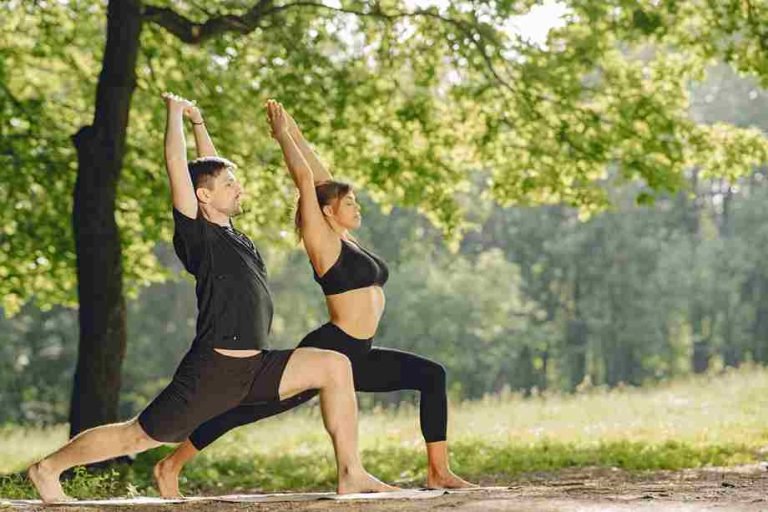 young-sportive-couple-doing-yoga-fitness-people-summer-park_11zon