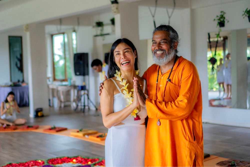 student with atma swami during closing ceremony