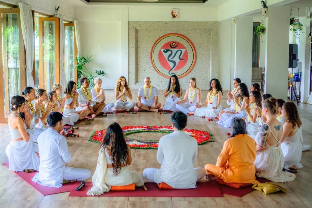 Deep Kumar and Sadhana Om leading meditation circle at yoga school Bali