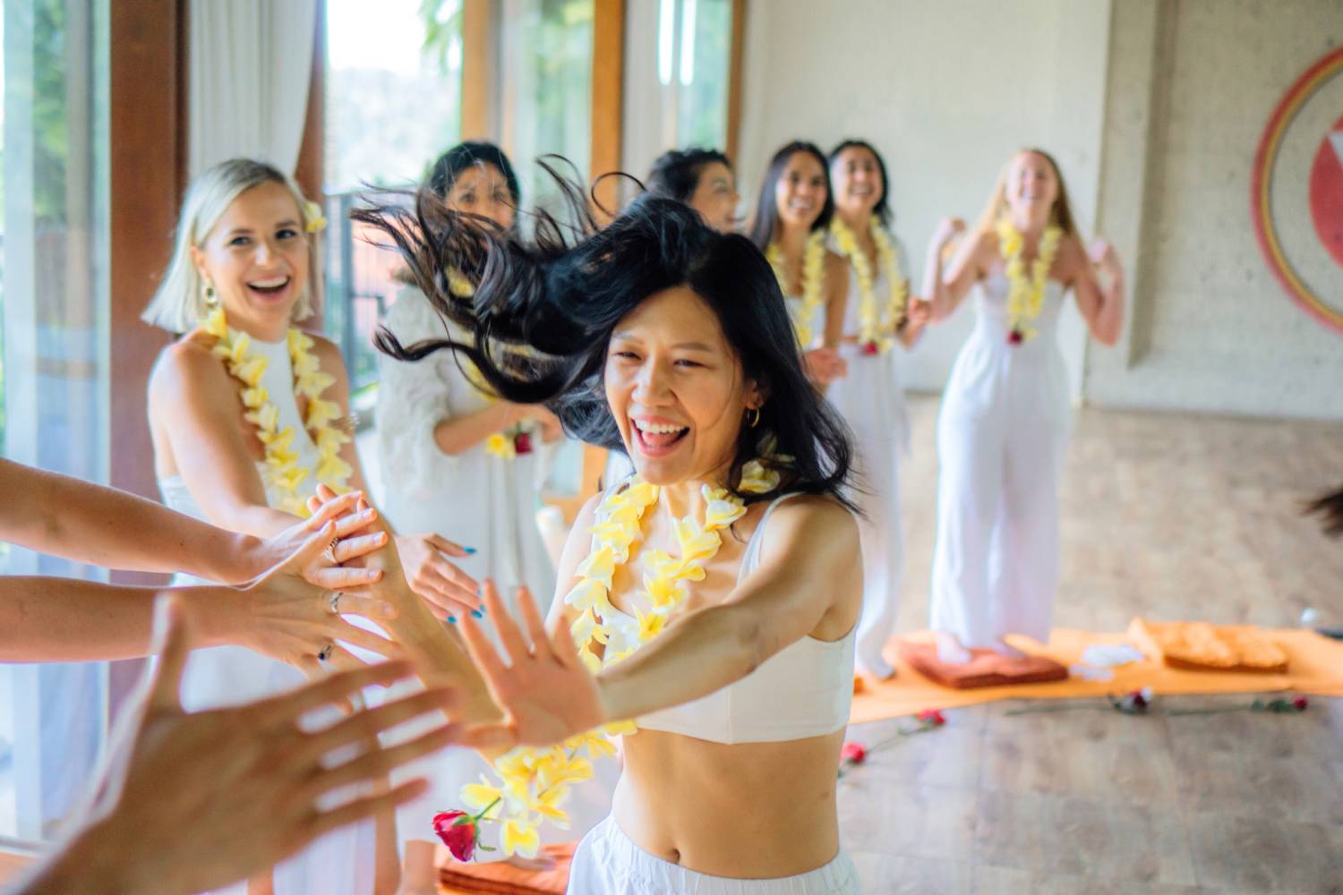 joyful student during immersive yoga retreat experience Bali