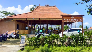 Colombian arepas and vegan plates at Casa Currandera, Ubud café with rice-field views.