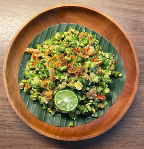 Traditional Balinese lawar salad with coconut, spices, and vegetables in Ubud.