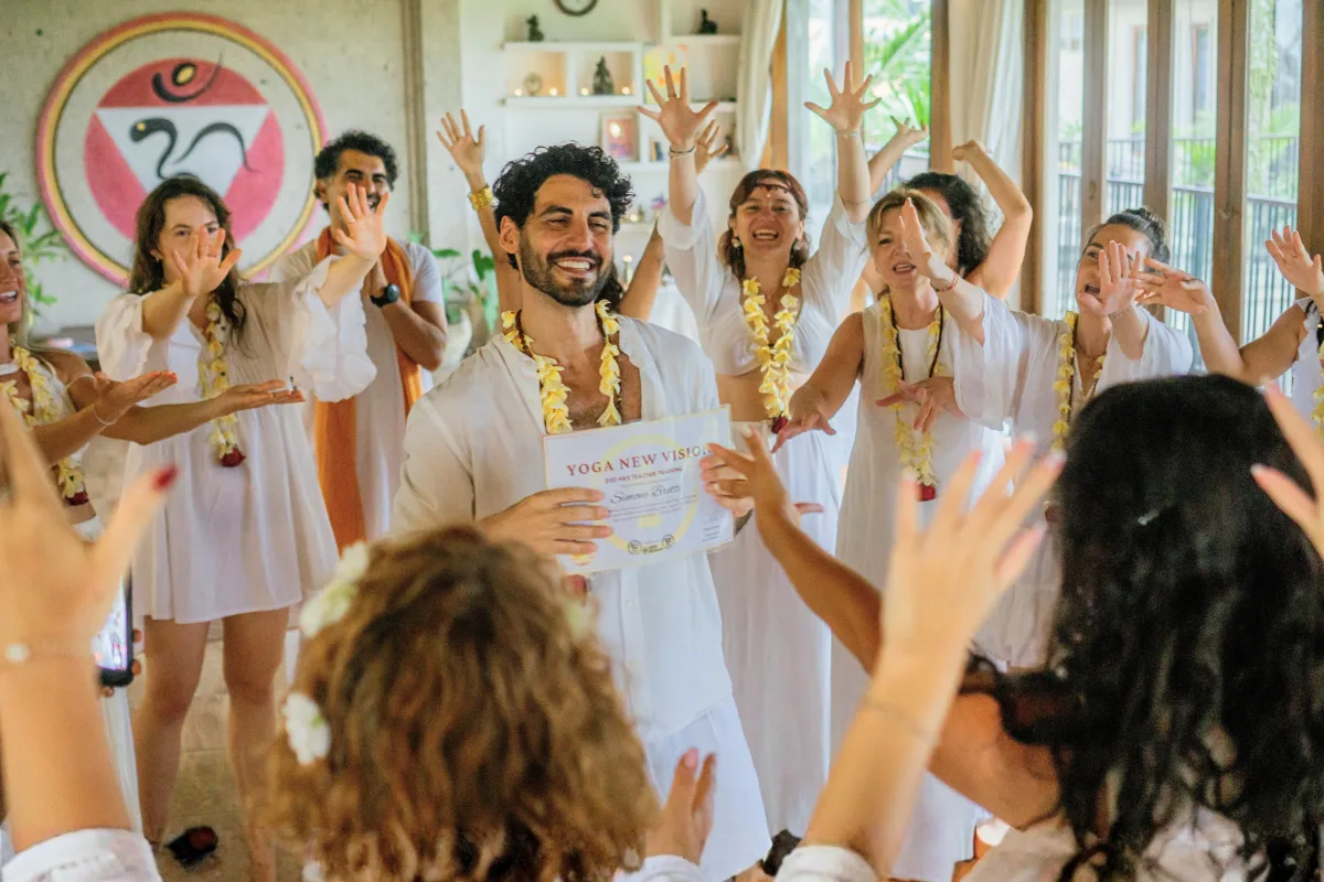 yoga teacher training graduates celebrating professional development completion at Yoga New Vision Bali