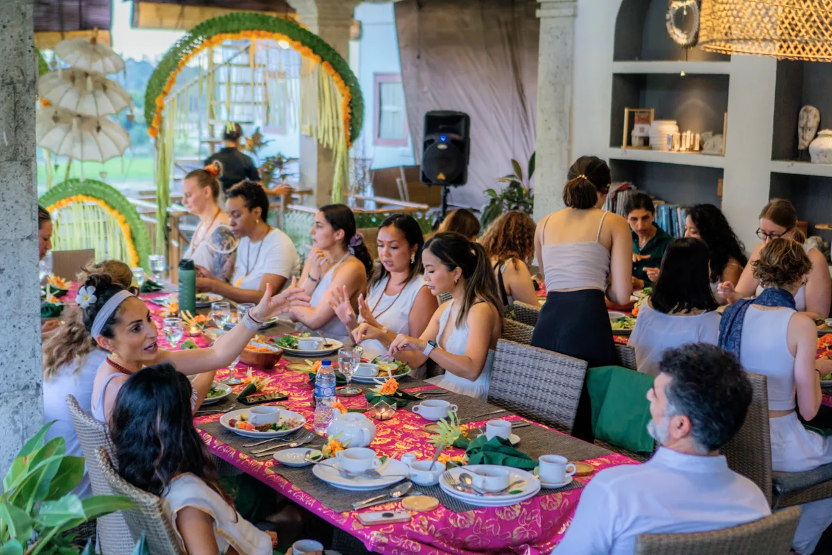 yoga teacher training students sharing meals together at Omham Retreats resort Ubud Bali