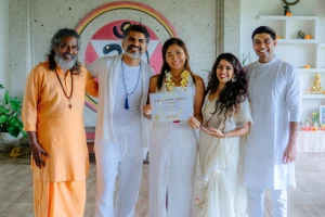 Deep Kumar presenting Yoga Alliance certificate to graduate of 200-hour yoga teacher training Bali